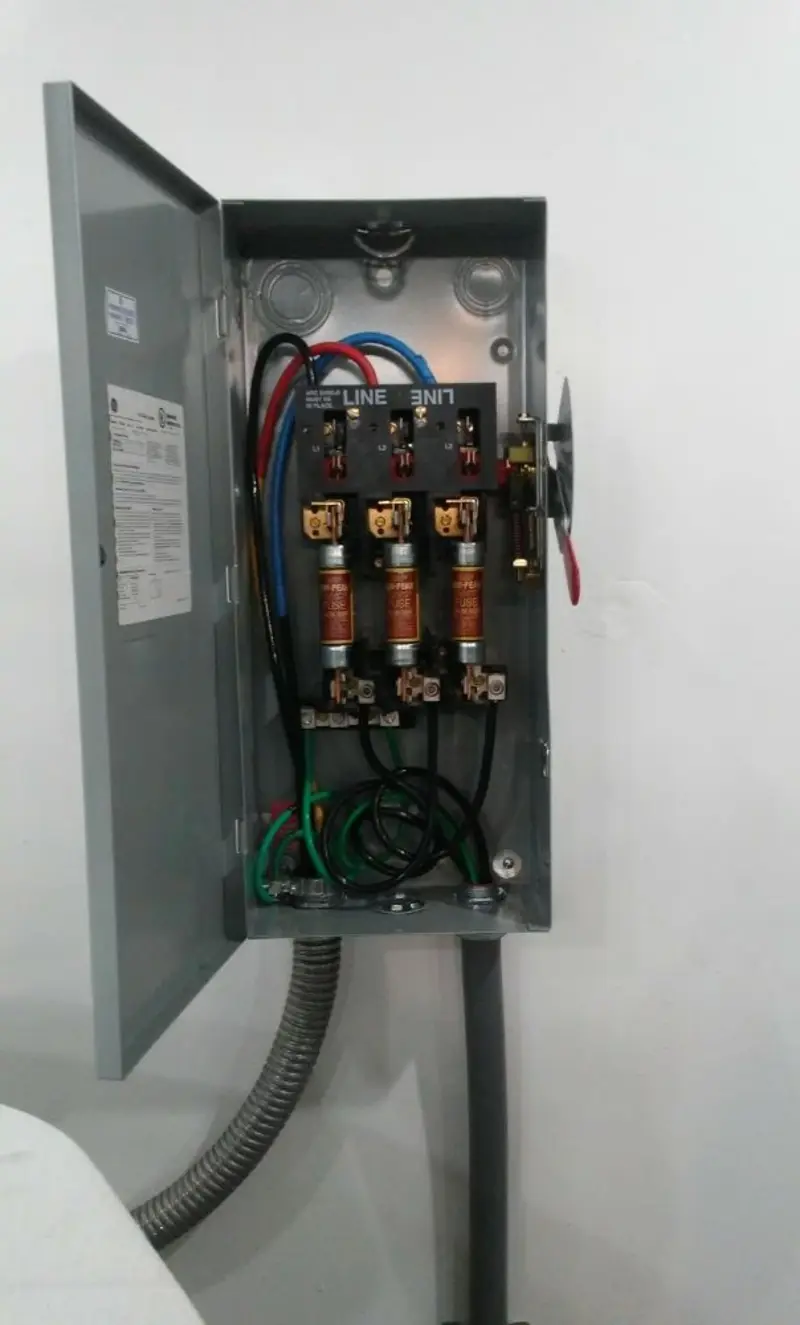 Three-phase disconnect switch installed for Smoke Detector Installation in Weston